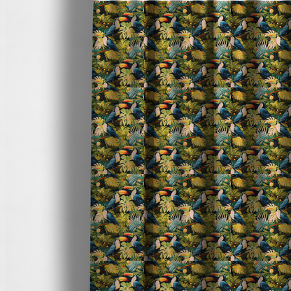 The fabric used to create these made-to-measure curtains is a tropical fabric featuring a repeating pattern of blue toucans perched among lush monstera leaves, palm fronds, and yellow flowers.   