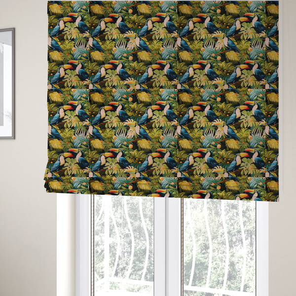 The fabric used to create these Roman blinds is a tropical fabric featuring a repeating pattern of blue toucans perched among lush monstera leaves, palm fronds, and yellow flowers.   