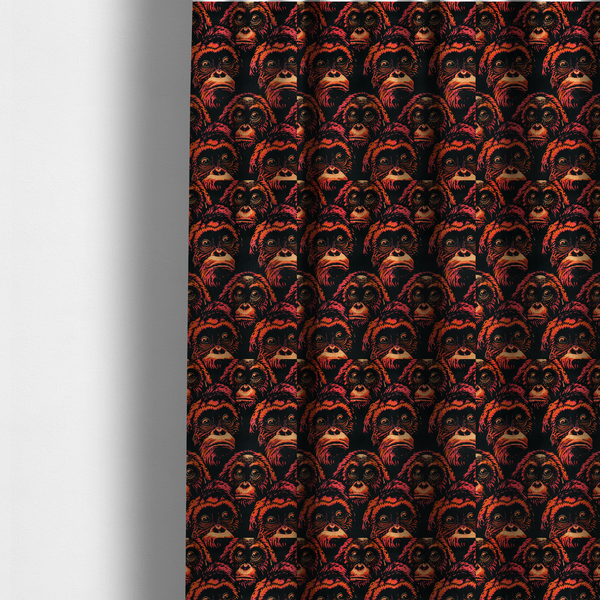 The fabric used to create these made-to-measure curtains is a fabric pattern featuring a repeating graphic illustration of orangutan faces in orange, peach, and reddish-pink tones against a dark black background.   