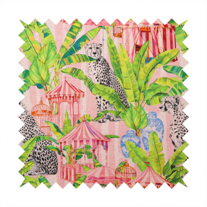 Pink striped fabric with a repeating pattern of seated cheetahs, tropical banana palm leaves, pink striped pavilions, birdcages, and blue porcelain ginger jars.   