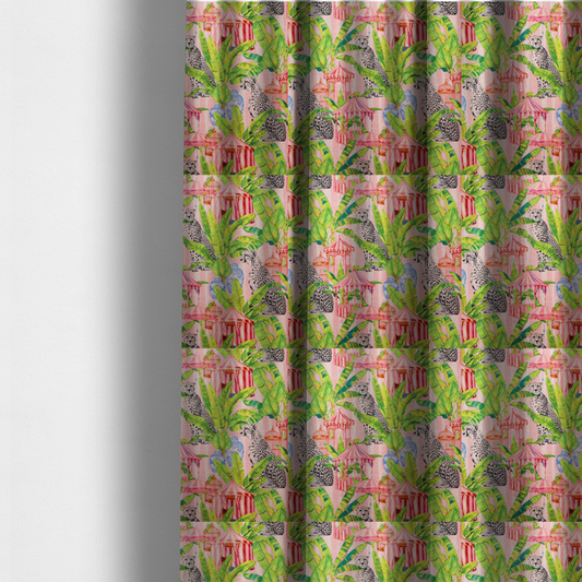 The fabric used to create these made-to-measure curtains is a pink striped fabric with a repeating pattern of seated cheetahs, tropical banana palm leaves, pink striped pavilions, birdcages, and blue porcelain ginger jars.   
