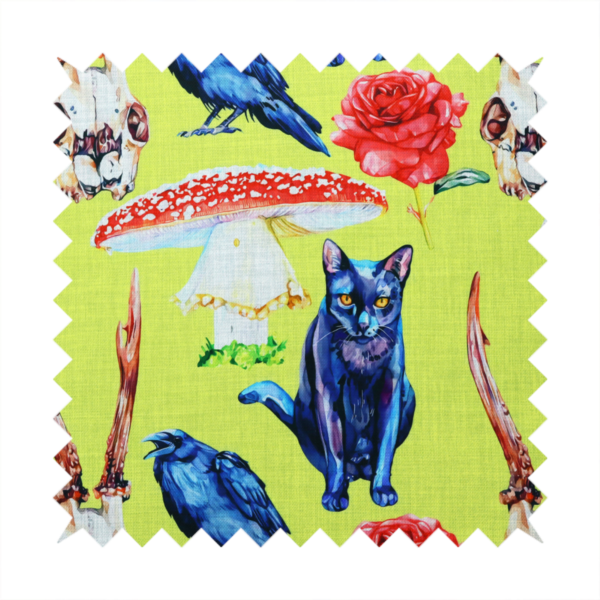 Chartreuse green fabric featuring a repeating pattern of black cats, blue ravens, red roses, horned animal skulls, and red fly agaric mushrooms.   