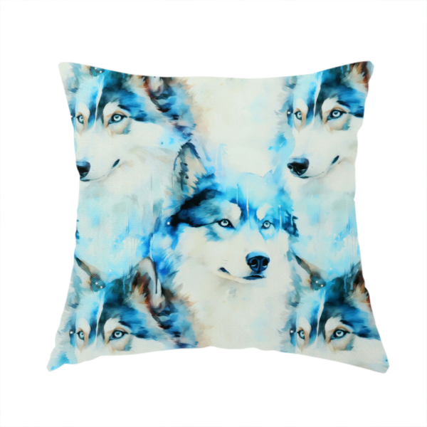 The fabric used to create this handmade cushion is a light fabric featuring a repeating watercolour pattern of husky or wolf portraits in shades of ice blue, teal, navy, and white.   