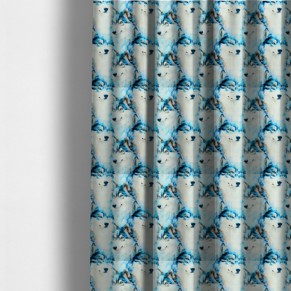 The fabric used to create these made-to-measure curtains is a light fabric featuring a repeating watercolour pattern of husky or wolf portraits in shades of ice blue, teal, navy, and white.   