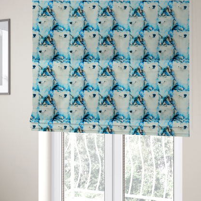 the fabric used to create these Roman blinds is a light fabric featuring a repeating watercolour pattern of husky or wolf portraits in shades of ice blue, teal, navy, and white.   