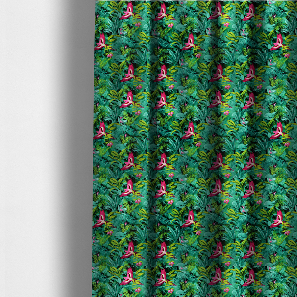The fabric used to create these made-to-measure curtains is a tropical fabric featuring vibrant magenta parrots in flight surrounded by lush green palm fronds, banana leaves, and pink tropical flowers.   