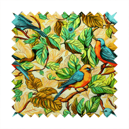 Vibrant fabric featuring a repeating pattern of blue and orange songbirds perched among green, mustard yellow, and golden foliage on branches.