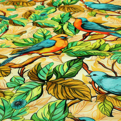 Vibrant fabric featuring a repeating pattern of blue and orange songbirds perched among green, mustard yellow, and golden foliage on branches.