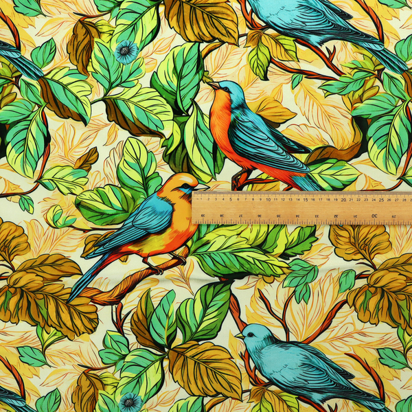 Vibrant fabric featuring a repeating pattern of blue and orange songbirds perched among green, mustard yellow, and golden foliage on branches.