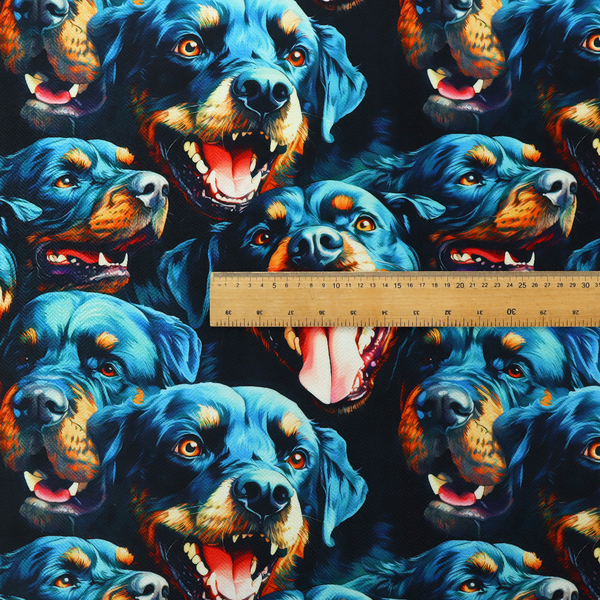 Fabric pattern featuring a repeating, artistic illustration of smiling Rottweiler dog portraits with vibrant blue fur, tan markings, and open mouths with tongues out.   