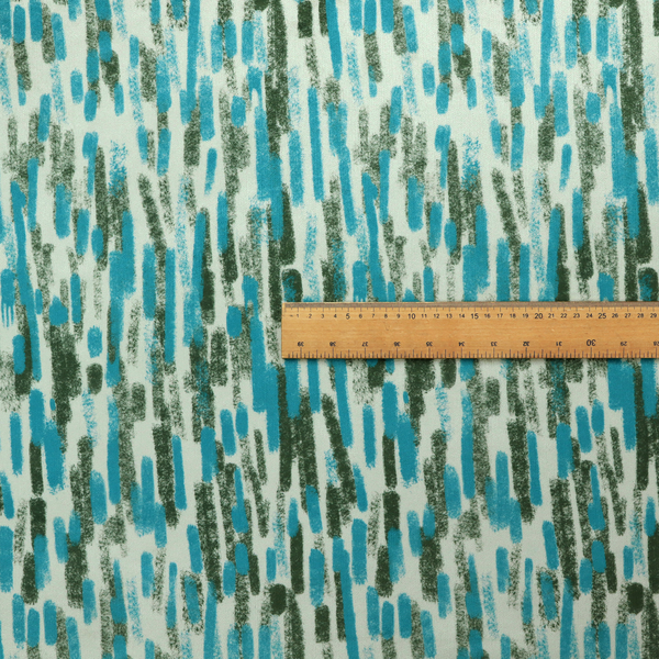 A textured abstract pattern featuring vertical brushstrokes or chalk-like marks in shades of vibrant turquoise blue and deep forest green against a light off-white or cream background.