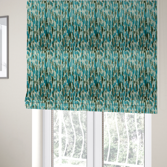 The fabric used to create these Roman blinds is a textured abstract pattern featuring vertical brushstrokes or chalk-like marks in shades of vibrant turquoise blue and deep forest green against a light off-white or cream background.