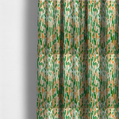 The fabric used to create these made-to-measure curtains is a textured abstract pattern featuring vertical brushstrokes or chalk-like marks in shades of vibrant orange and green against a light off-white or cream background.   