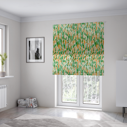 The fabric used to create these Roman blinds is a textured abstract pattern featuring vertical brushstrokes or chalk-like marks in shades of vibrant orange and green against a light off-white or cream background.   