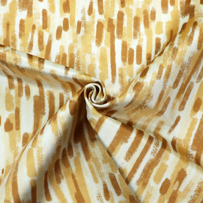 A textured abstract pattern featuring vertical brushstrokes or chalk-like marks in shades of warm mustard yellow and golden brown against a light off-white or cream background.   