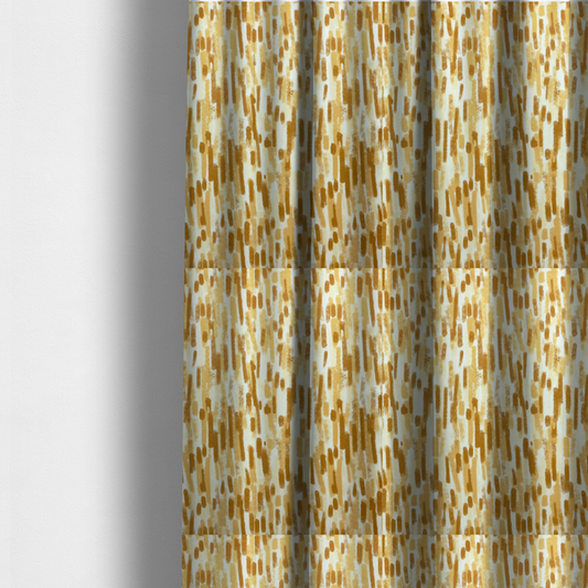 The fabric used to create these made-to-measure curtains is a textured abstract pattern featuring vertical brushstrokes or chalk-like marks in shades of warm mustard yellow and golden brown against a light off-white or cream background.   