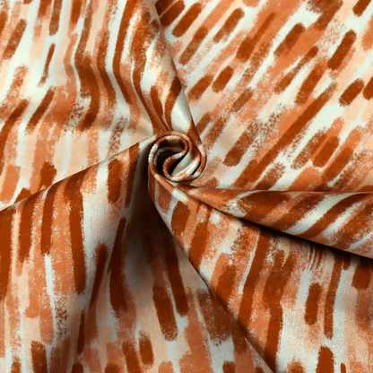 A textured abstract pattern featuring vertical brushstrokes or chalk-like marks in shades of warm terracotta and burnt orange against a light off-white or cream background.