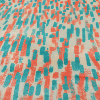 Fabric featuring an abstract, vertical brushstroke pattern in teal and coral red on an off-white background.   