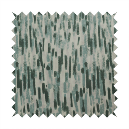Fabric featuring an abstract vertical brushstroke pattern in dark green, sage, and grey on a light neutral background.   