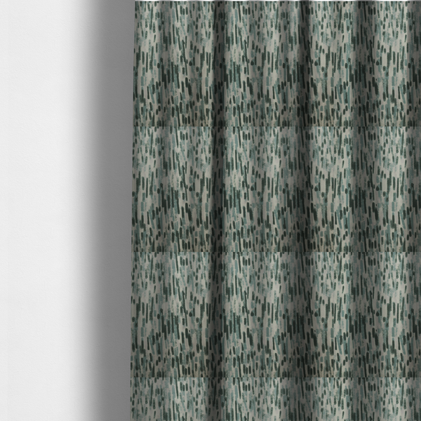 The fabric used to create these made-to-measure curtains is a fabric featuring an abstract vertical brushstroke pattern in dark green, sage, and grey on a light neutral background.   