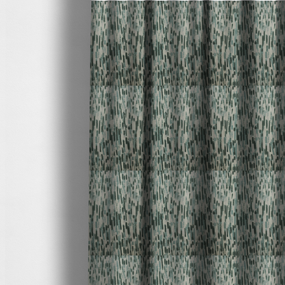 The fabric used to create these made-to-measure curtains is a fabric featuring an abstract vertical brushstroke pattern in dark green, sage, and grey on a light neutral background.   