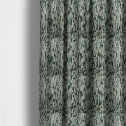 The fabric used to create these made-to-measure curtains is a fabric featuring an abstract vertical brushstroke pattern in dark green, sage, and grey on a light neutral background.   