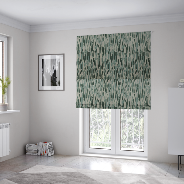 The fabric used to create these Roman blinds is a fabric featuring an abstract vertical brushstroke pattern in dark green, sage, and grey on a light neutral background