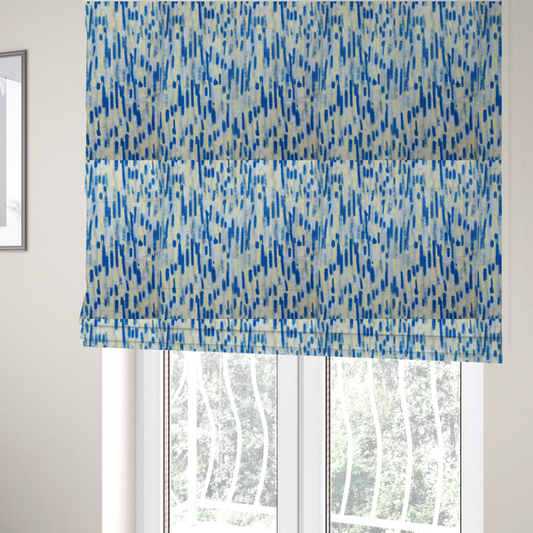 The fabric used to create these Roman blinds is a fabric featuring an abstract, vertical brushstroke pattern in vibrant cobalt blue, soft pastel yellow, and light grey.