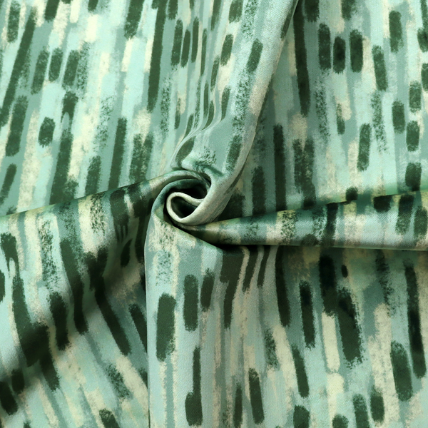 Fabric featuring an abstract vertical brushstroke pattern in dark green, mint, and sage on a soft seafoam background.