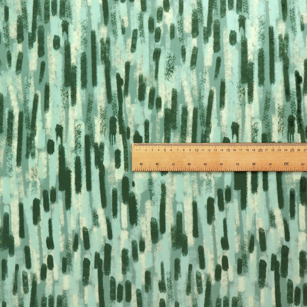 Fabric featuring an abstract vertical brushstroke pattern in dark green, mint, and sage on a soft seafoam background.