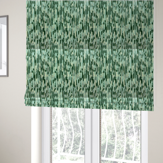 The fabric used to create these Roman blinds is a fabric featuring an abstract vertical brushstroke pattern in dark green, mint, and sage on a soft seafoam background.