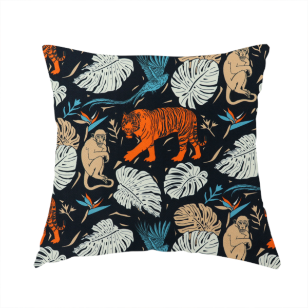 The fabric used to create this handmade cushion is a fabric print featuring orange striped tigers, sitting beige monkeys, flying blue tropical birds, Monstera leaves, and bird of paradise flowers set against a dark navy background.   