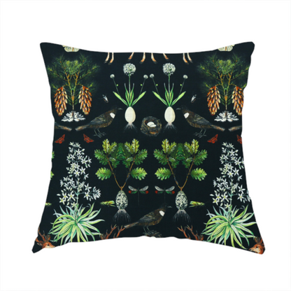 The fabric used to create this handmade cushion is a symmetrical woodland fabric pattern featuring reddish-brown stags with antlers, pinecones, birds, nests with eggs, and botanical flora on a black background.   