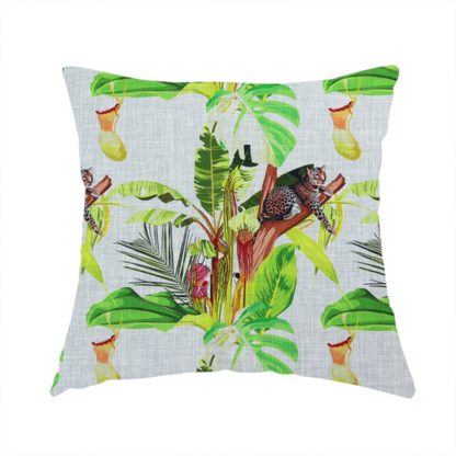 The fabric used to create this handmade cushion is a tropical jungle fabric featuring leopards resting on tree branches alongside pitcher plants, banana leaves, and Monstera foliage on a light grey textured background.