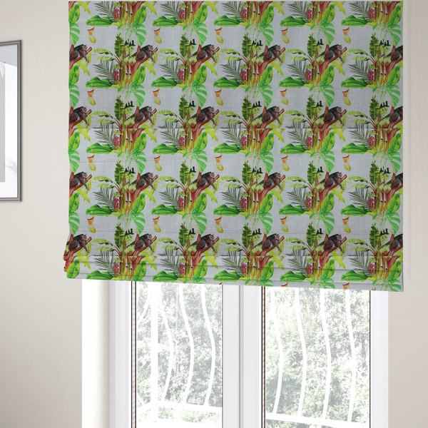 The fabric used to create these Roman blinds is a tropical jungle fabric featuring leopards resting on tree branches alongside pitcher plants, banana leaves, and Monstera foliage on a light grey textured background.