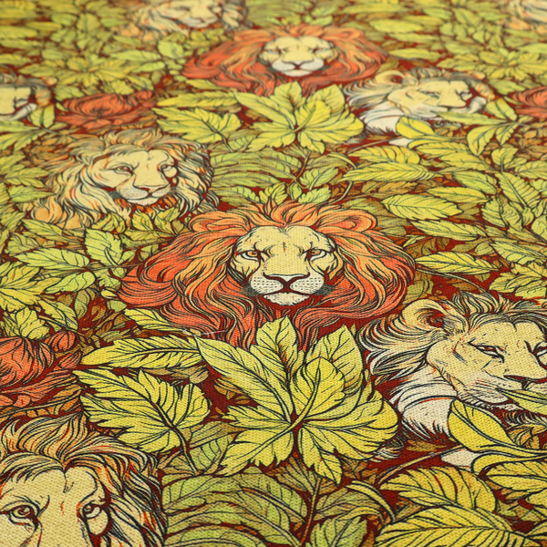 Fabric pattern featuring male lions emerging from dense, golden-yellow foliage and red flowers in an illustrated Arts and Crafts style.   