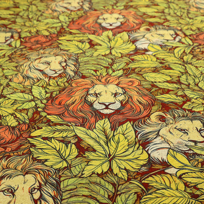 Fabric pattern featuring male lions emerging from dense, golden-yellow foliage and red flowers in an illustrated Arts and Crafts style.   