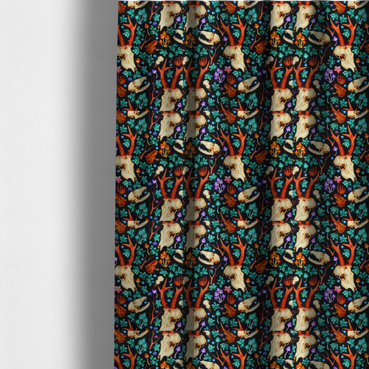 The fabric used to create these made-to-measure curtains is a gothic forest fabric featuring animal skulls with red antlers, bright orange toads, colourful mushrooms, berries, and green foliage on a black background.   