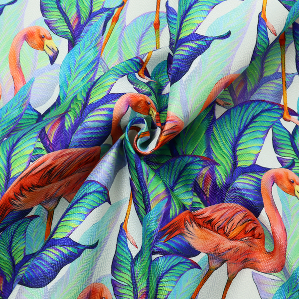 Vibrant tropical fabric pattern featuring coral-pink flamingos nestled among lush green, teal, and blue palm foliage against a white background.   