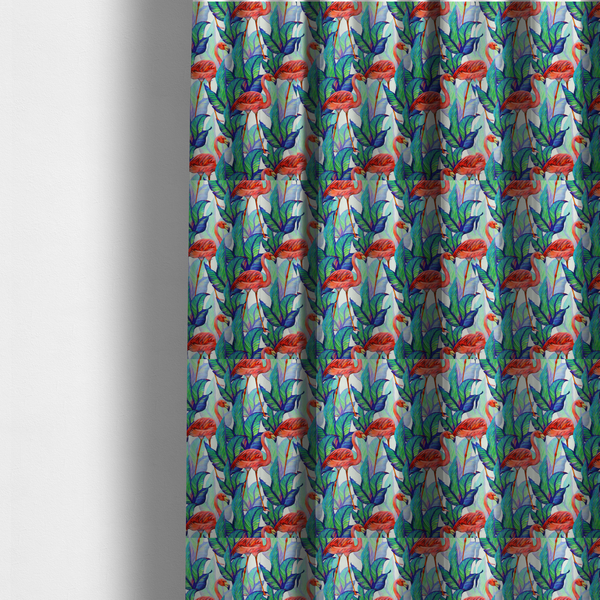 The fabric used to create these made-to-measure curtains is a vibrant tropical fabric pattern featuring coral-pink flamingos nestled among lush green, teal, and blue palm foliage against a white background.   