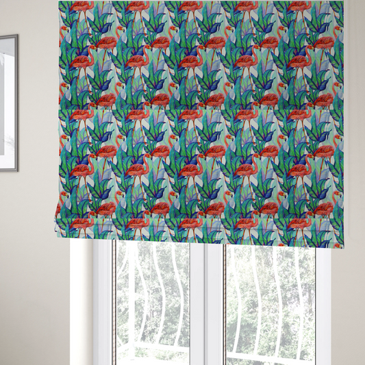 The fabric used to create these Roman blinds is a vibrant tropical fabric pattern featuring coral-pink flamingos nestled among lush green, teal, and blue palm foliage against a white background.   