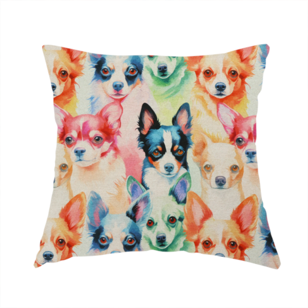The fabric used to create this handmade cushion is a colourful fabric pattern featuring watercolour portraits of chihuahuas in shades of tan, pink, blue, green, and black on a light cream background.   