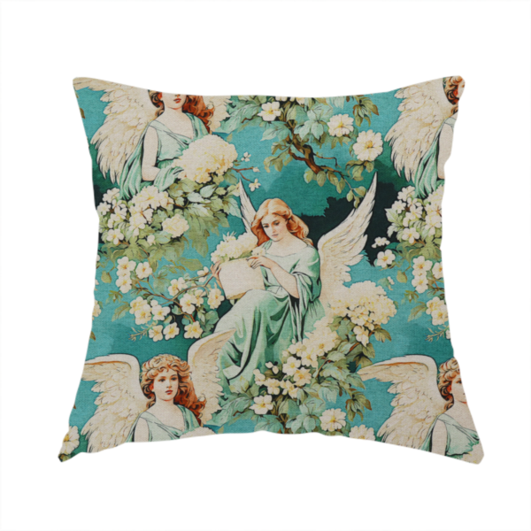 The fabric used to create this handmade cushion is a vintage victorian style fabric pattern featuring winged angels in sage green gowns surrounded by white blossom branches on a teal and dark forest green background.   