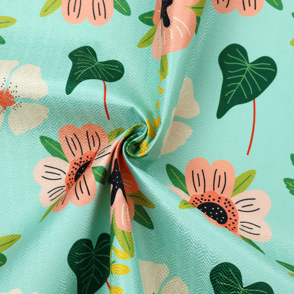 Whimsical floral fabric featuring peach and cream flowers, yellow vining stems, and dark green heart-shaped leaves on a light mint turquoise background.   