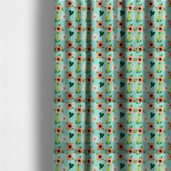 The fabric used to create these made-to-measure curtains is a whimsical floral fabric featuring peach and cream flowers, yellow vining stems, and dark green heart-shaped leaves on a light mint turquoise background.   