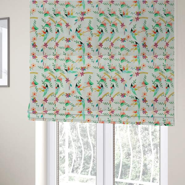 The fabric used to create these Roman blinds is a playful floral fabric featuring scattered colourful bouquets with light blue, coral, purple, and peach blossoms among green stems and mustard foliage on a off-white background.   