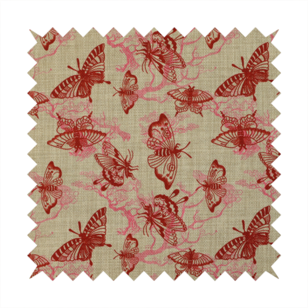 This fabric layers large red butterflies on top of pink tree illustrations, on a neutral background.