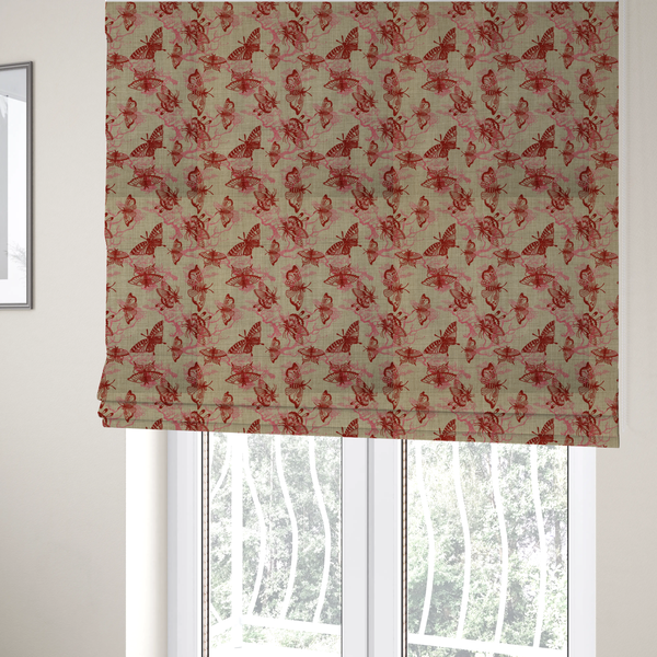 The fabric used to create these Roman blinds layers large red butterflies on top of pink tree illustrations, on a neutral background.