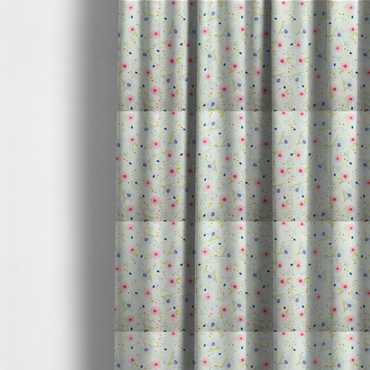 The fabric used to create these made-to-measure curtains is a delicate watercolour floral fabric featuring soft pink poppies, pale blue cosmos, and tiny cornflower buds on a white herringbone-textured background.