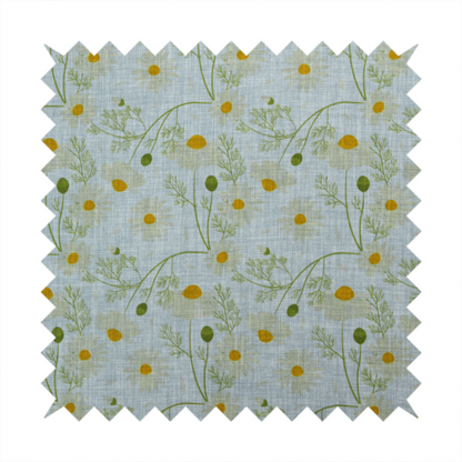 Light blue fabric with a repeating botanical chamomile flower and green foliage pattern